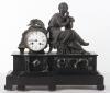 A late 19th century French slate and marble mantle clock