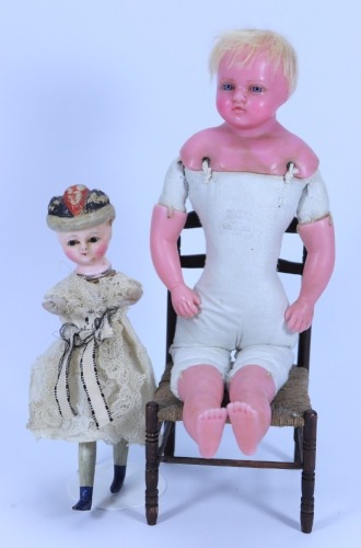 A poured wax Pierotti shoulder head doll, English circa 1860,