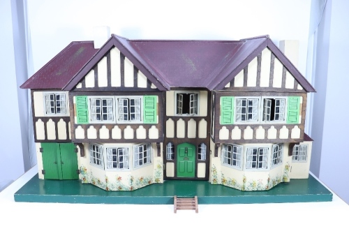 A good example of a Tri-ang No.93 large Dolls House in Tudor style, English 1930s,