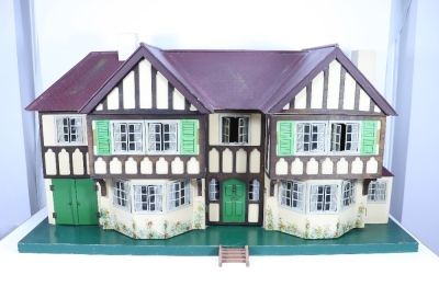 A good example of a Tri-ang No.93 large Dolls House in Tudor style, English 1930s,