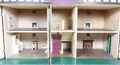 A good example of a Tri-ang No.93 large Dolls House in Tudor style, English 1930s, - 2