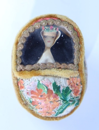 A miniature novelty of nun in a shell, European 19th century,