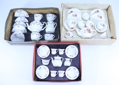 Three boxed Children’s Tea Services,