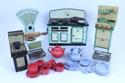 A selection of children’s kitchen and domestic toys, 1920s-50s, - 2