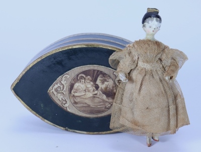 A painted wooden Grodnertal doll in original clothes and decorative oval box, German circa 1820,