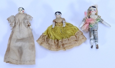 Three miniature painted wooden Grodnertal dolls, German 1820s,