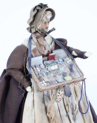 A good all original wax pedlar doll on wooden body, German 1830s, - 2