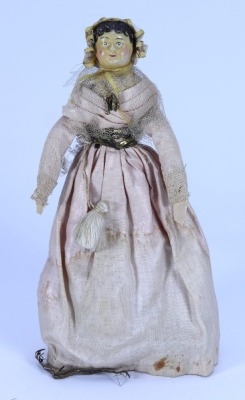 A papier-mache shoulder head dolls house doll in original clothes, German circa 1830,