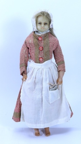 *A poured wax shoulder head doll, English circa 1860,