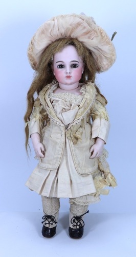 *A Leon Casimer Bru circle dot bisque head Bebe doll, French circa 1880,