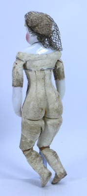 A rare Leontine Rohmer glazed bisque shoulder swivel head fashion doll with trunk and trousseau, French circa 1860, - 9