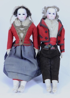 A pair of Francoise Gauthier bisque shoulder head fashion dolls in original clothes, French circa 1870,