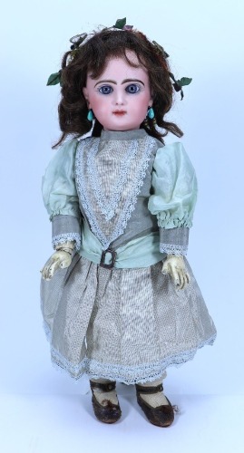 A rare Rabery & Delphieu mechanical walking bisque head bebe doll, French circa 1890,