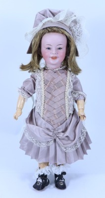 An S.F.B.J 229 bisque head character walking doll, French circa 1910,