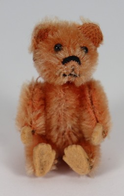 A miniature Schuco apricot mohair Teddy bear, German 1920s,