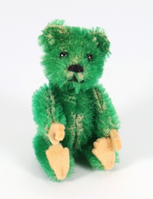 A miniature Schuco green mohair Teddy bear, German 1920s,