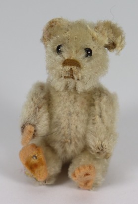 A miniature Schuco white mohair Teddy bear, German 1920s,