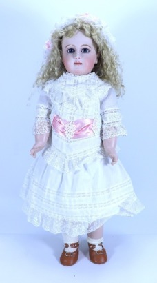 A reproduction Emile Jumeau A bisque head doll, 1993, size 10,