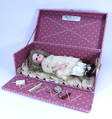 A reproduction Bru Jne bisque shoulder head doll I presentation box,
