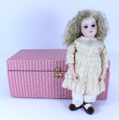 A reproduction Bru Jne bisque shoulder head doll I presentation box, - 2