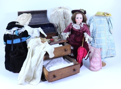 A Belton-type bisque head doll and trousseau, probably Bahr & Proschild, German, circa 1885,