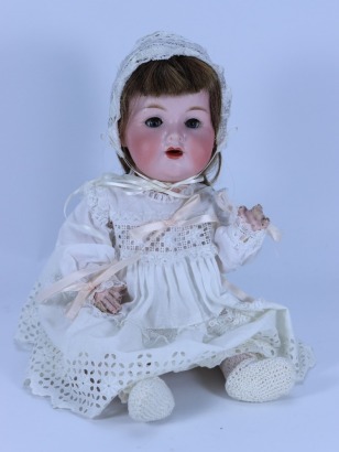 An A.M 990 bisque head baby doll, German, circa 1915,