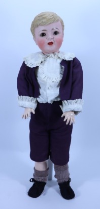 A rare large 267/50 bisque head character boy doll with moulded hair, German circa 1910,