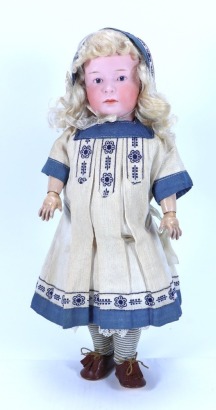 A Gebruder Heubach 6969 bisque head ‘Pouty’ doll, German circa 1910