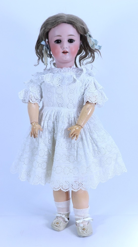 A Heubach Koppelsdorf 250 bisque head girl doll, German circa 1910,