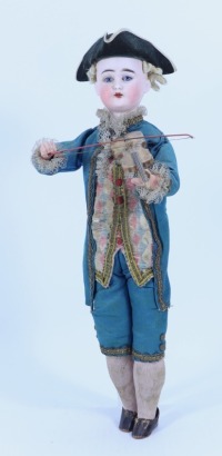 An all original bisque head Gentleman musical squeeze-toy doll with violin, German circa 1900,