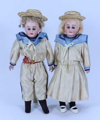 A pair of bisque shoulder head dolls, German, circa 1910,