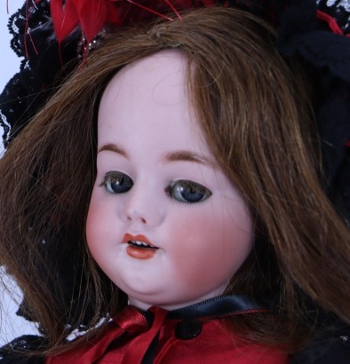 A Simon & Halbig 1039/Roullet & Decamps mechanical ‘walking’ bisque head doll, German, circa 1910,