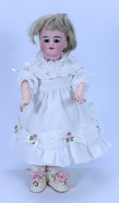 A Simon & Halbig 1009 bisque head doll, German circa 1915,