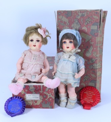 A pair of all original boxed A.M 996 sprayed bisque head dolls, German 1930s,