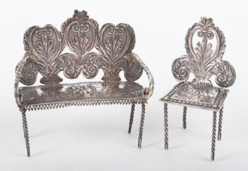 A set of miniature silver bench and chair