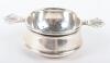 A silver tea strainer on stand, Birmingham 1920,