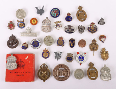 Collection of WW1 and WW2 War Service badges and associated Victory pins etc