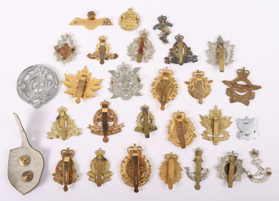 Good range of Canadian QC Cap Badges - 2