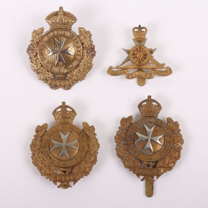 Four Maltese Militia Badges