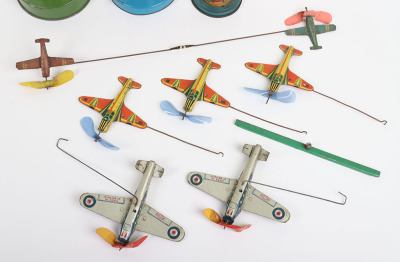 Three tinplate Aero-tower novelty toys - 2