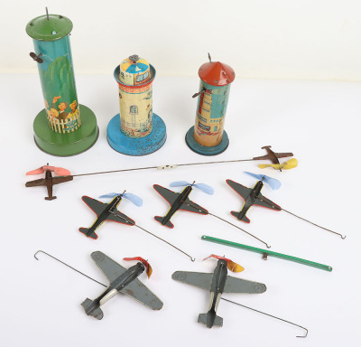 Three tinplate Aero-tower novelty toys - 4