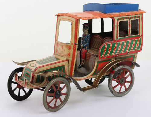 Early tinplate clockwork Motor Car by R & co, circa 1900