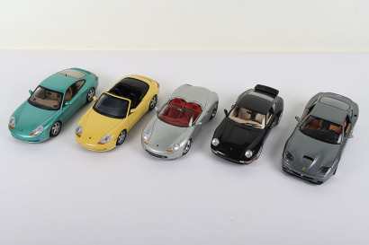 Four Porsche 1:18 scale Models