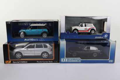 Four Boxed Diecast 1:18 Scale Models