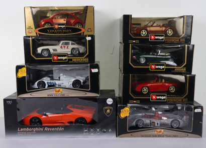 Seven boxed 1:18 Scale Cars