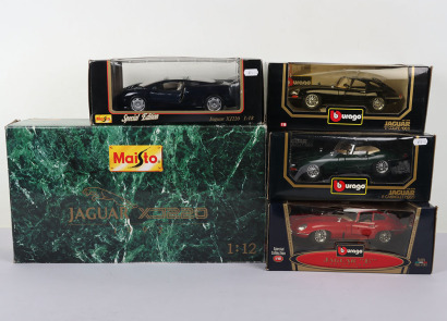 Four boxed Jaguar 1:18 Scale Cars