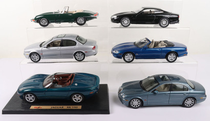 Six Unboxed 1:18 Scale Model Jaguars