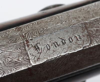 Saw handled back action percussion target pistol by JOSEPH HOLLIS, LONDON, c.1840 - 8