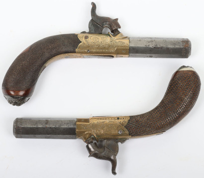 Pair of boxlock percussion pocket pistols retailed by COLGAN of WATERFORD
