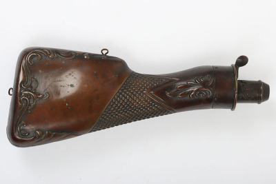 Copper gun sized powder flask in the form of a gun stock